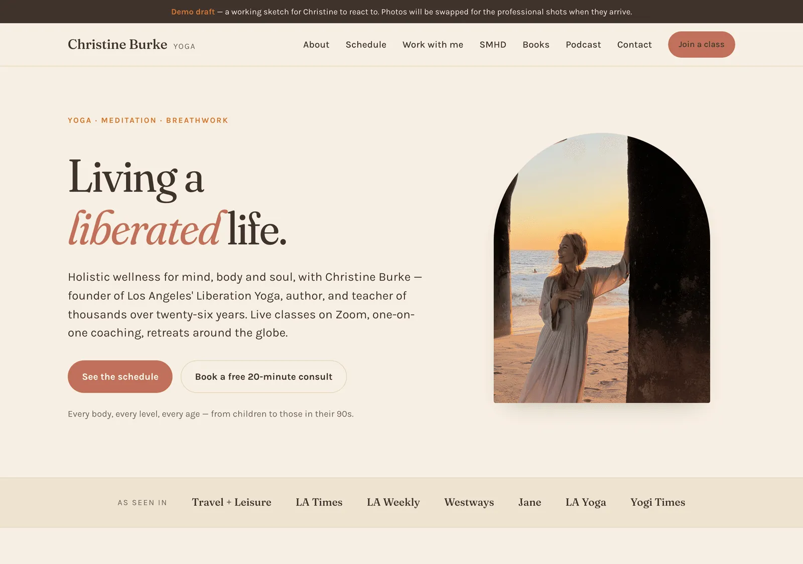 The Christine Burke Yoga homepage: a serif headline reading 'Living a liberated life' beside a photograph of Christine on a beach at sunset, over a warm cream background.